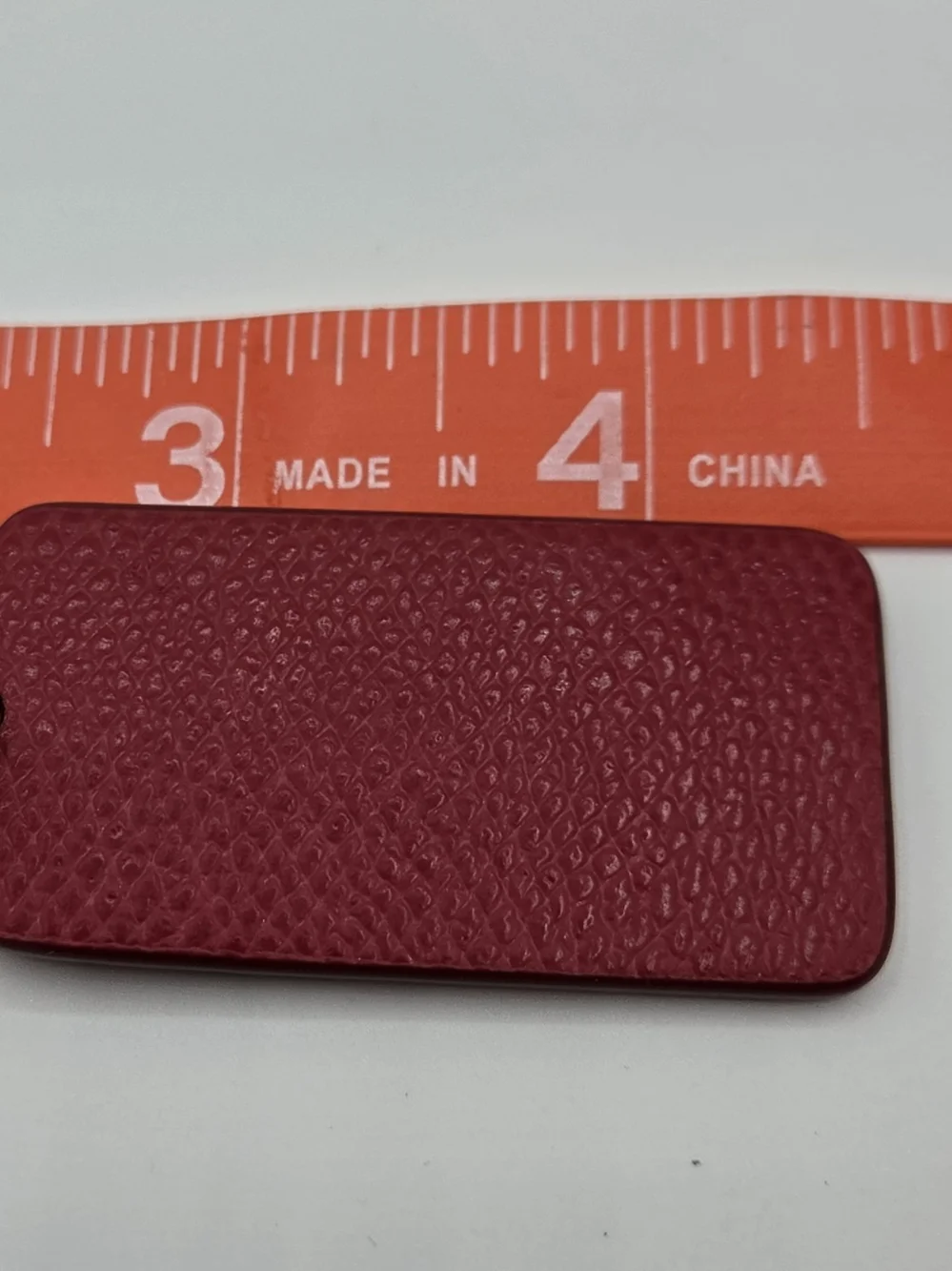 Coach Pink-Red Textured Leather Key Tag with Gold Ball Chain